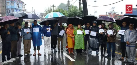 Journalists hold silent protest at Maitighar against arrests and police raids on media houses